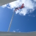 American flag flying above the memorial