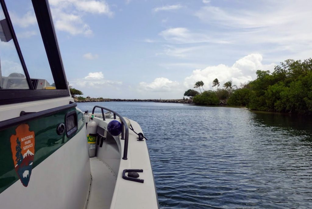 NPS boat heading to sea from marina