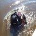 standing in the river before a dive